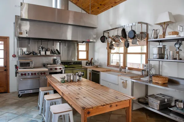 a dining room with furniture and entryway