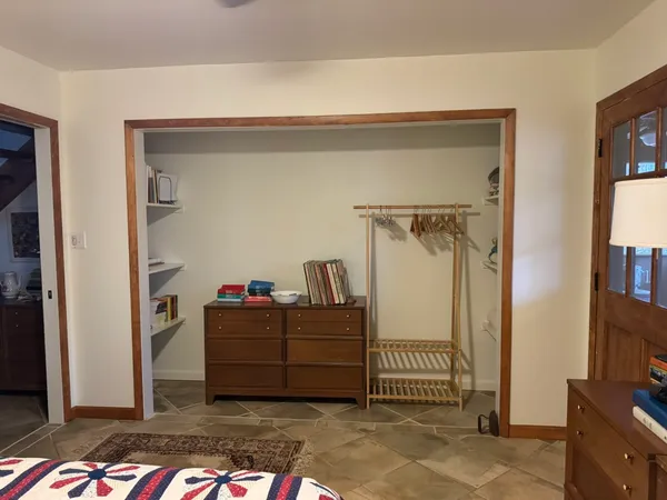 a bathroom with a sink a mirror and a shower