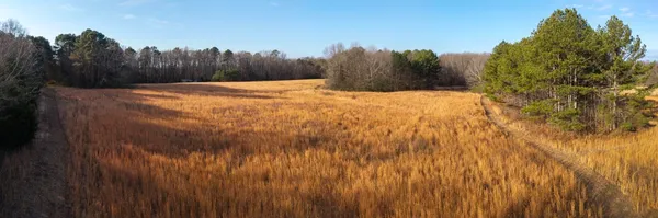 a view of swimming pool with an outdoor space and seating area