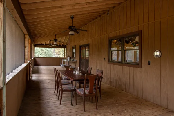 a view of a entryway door with wooden floor