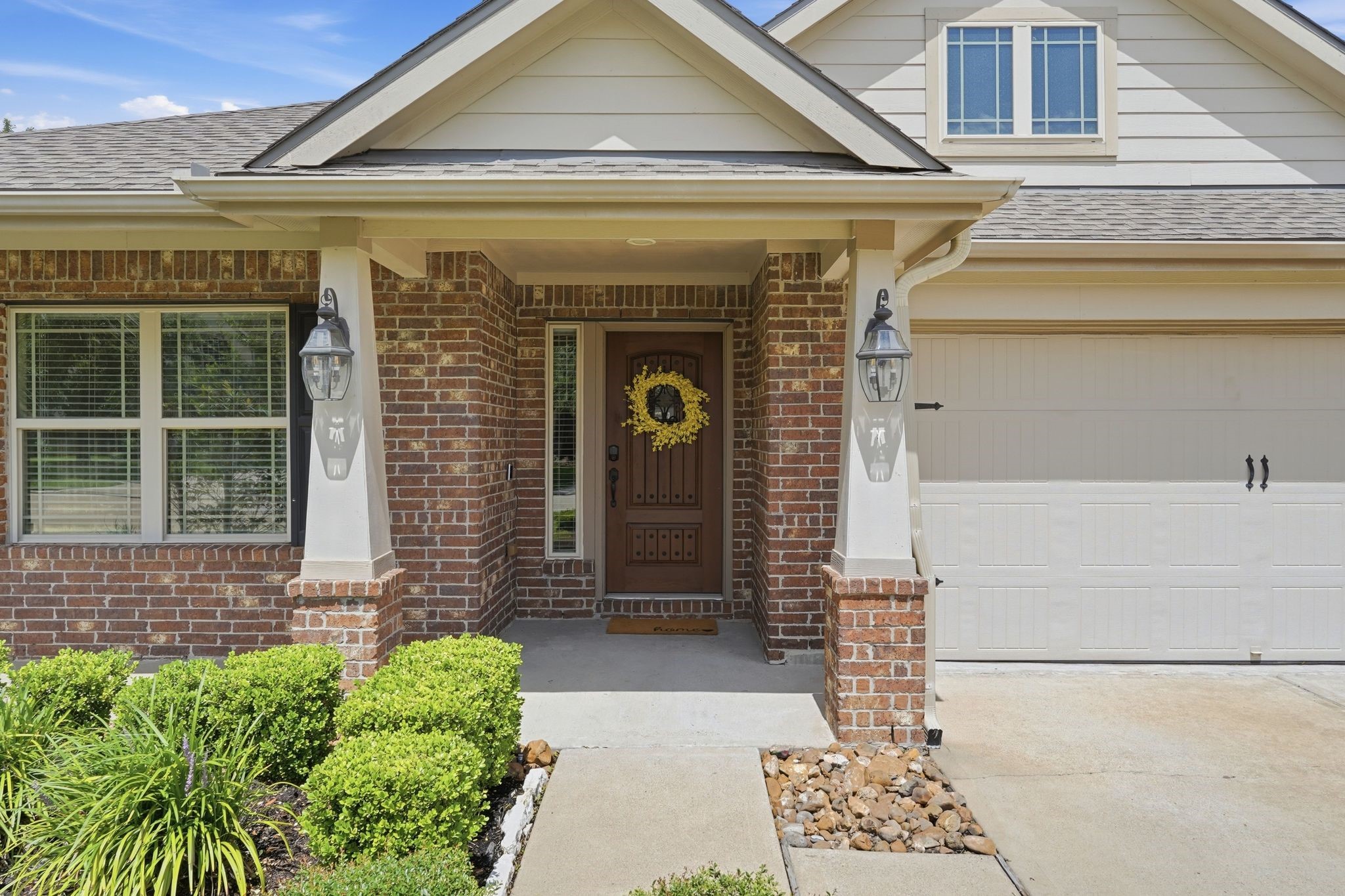 18227 Tacoma Ridge Drive Tomball, TX 77377 - Photo 3 of 45 Covered front porch with a welcoming entry and charming architectural details.