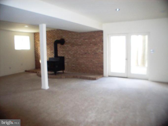 12725 Jesse Smith Road Mount Airy, MD 21771 - Photo 20 of 28 Woodstove to keep things cozy