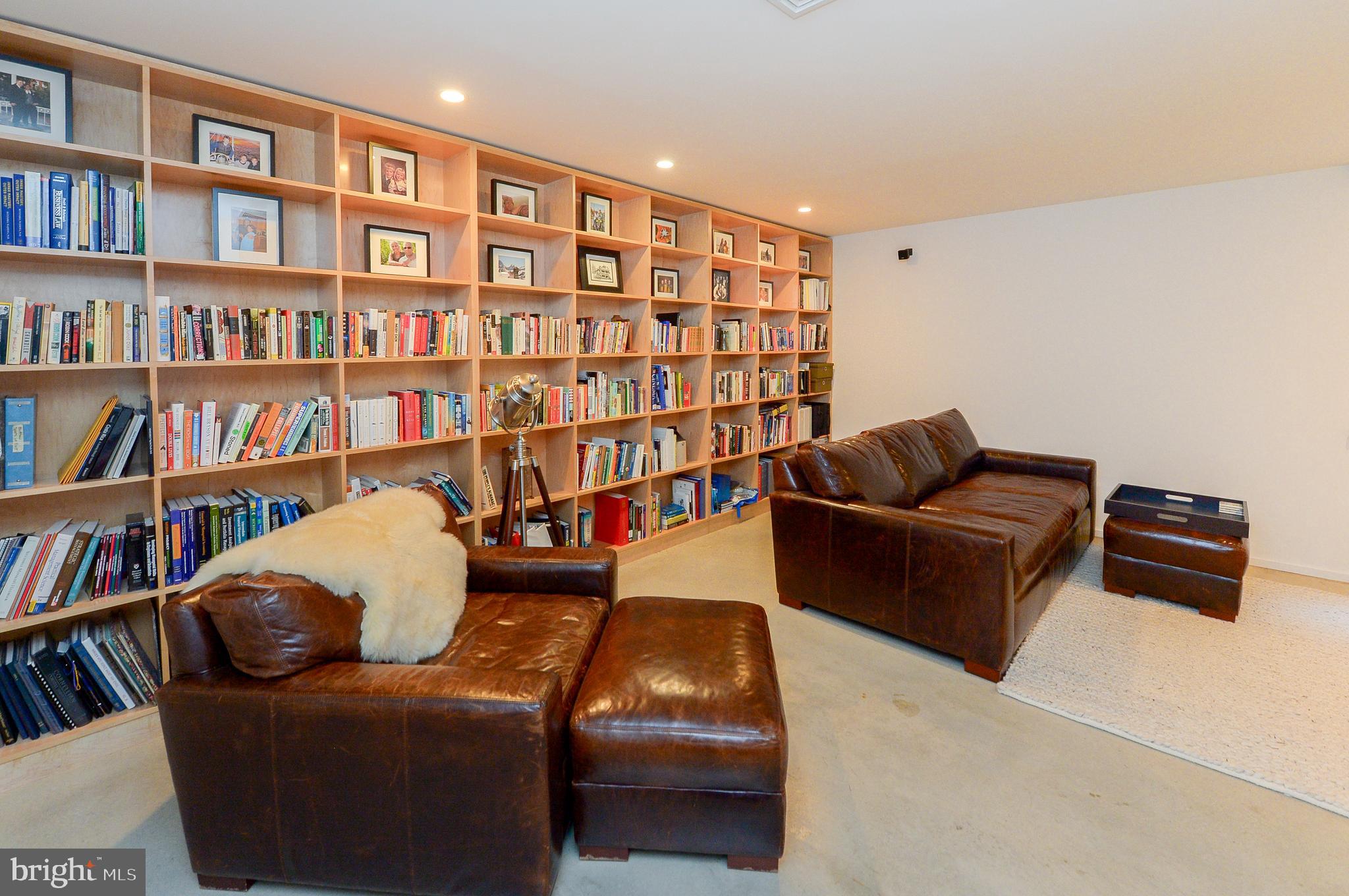 1119 North 3rd Street Philadelphia, PA 19123 - Photo 14 of 46 a living room with furniture and a book shelf