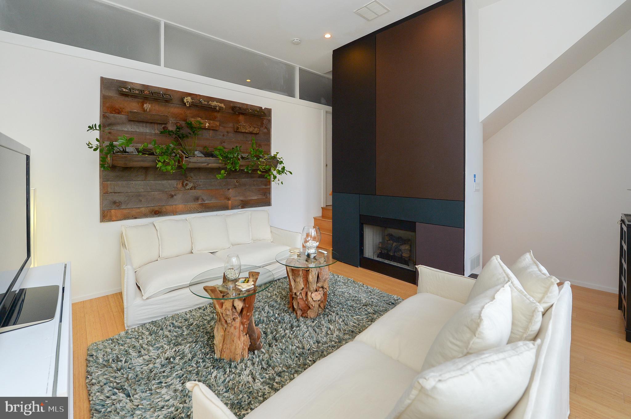 1119 North 3rd Street Philadelphia, PA 19123 - Photo 21 of 46 a living room with furniture and a flat screen tv