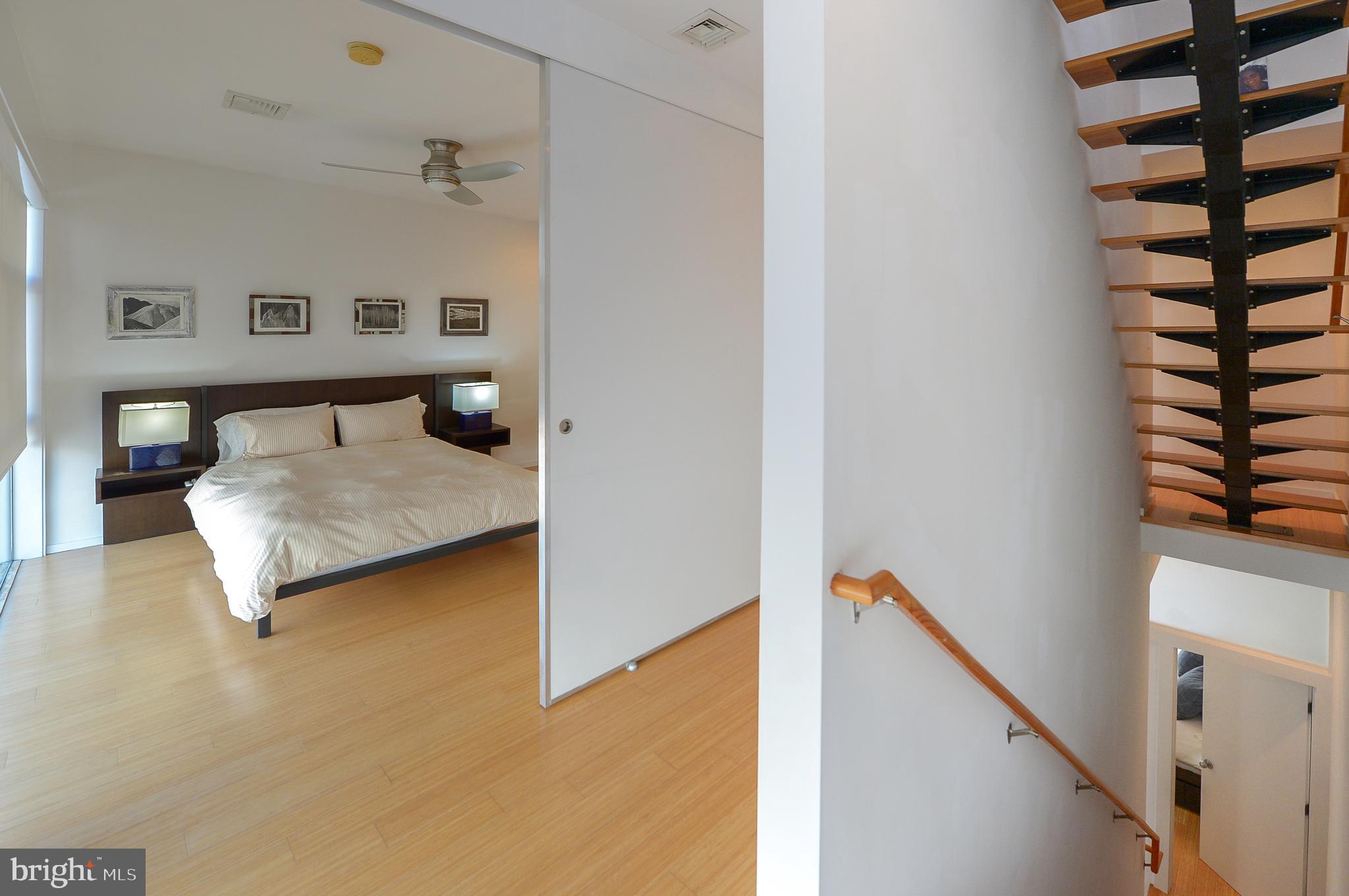 1119 North 3rd Street Philadelphia, PA 19123 - Photo 27 of 46 a living room with furniture and a wall painting