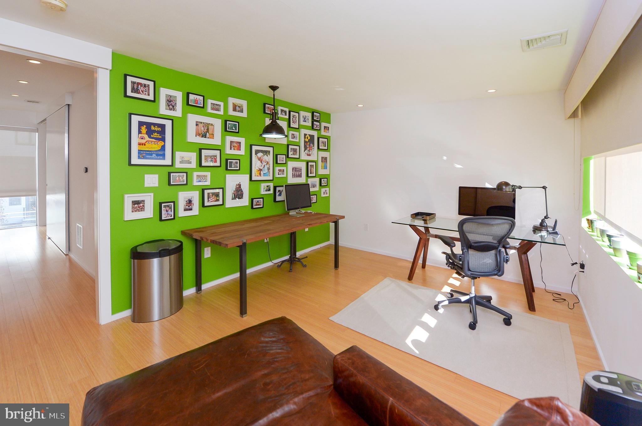 1119 North 3rd Street Philadelphia, PA 19123 - Photo 32 of 46 a living room with furniture and a flat screen tv