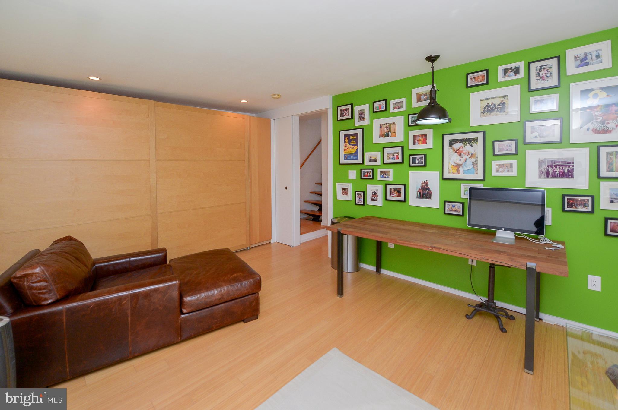 1119 North 3rd Street Philadelphia, PA 19123 - Photo 33 of 46 a living room with furniture and a window
