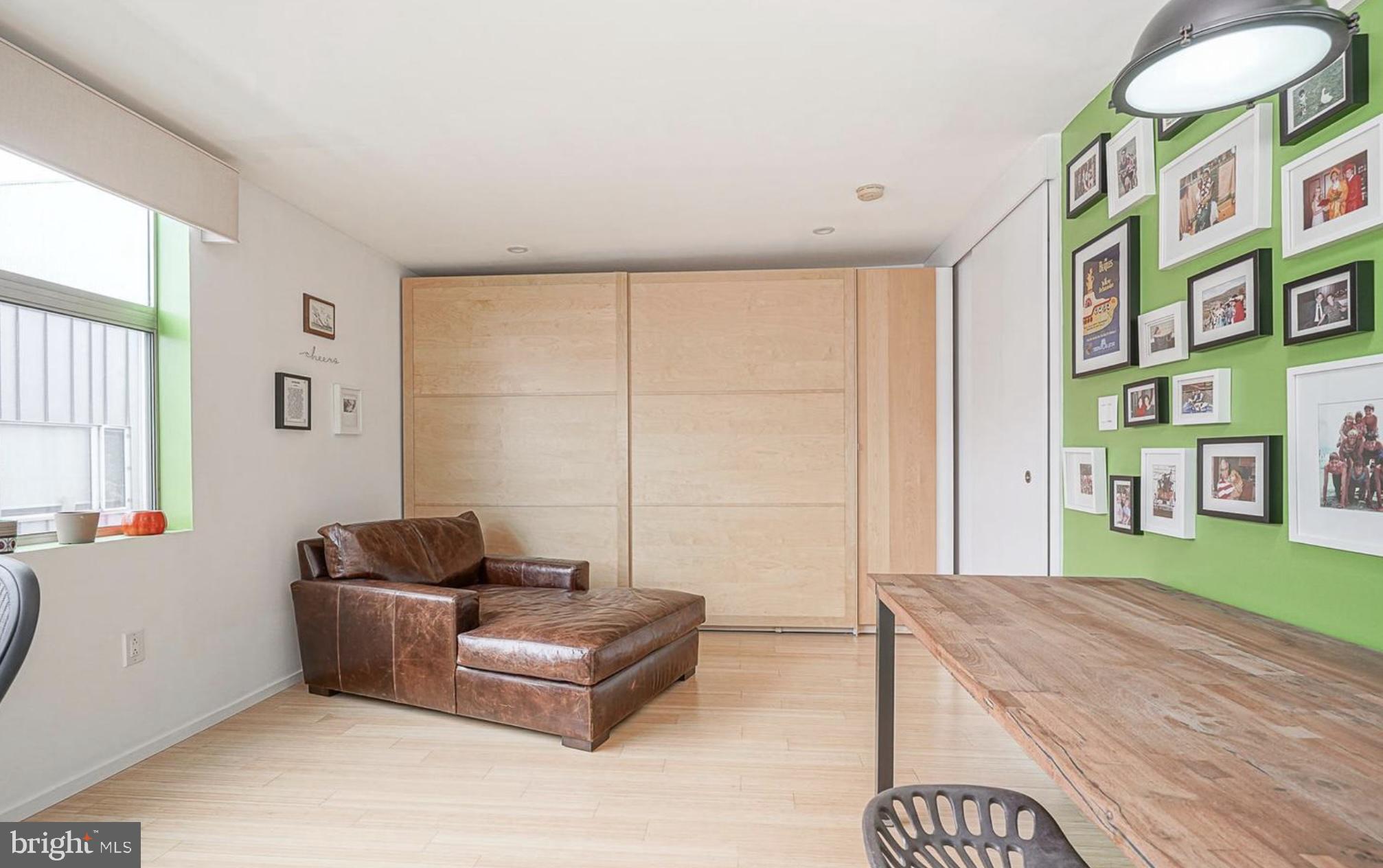 1119 North 3rd Street Philadelphia, PA 19123 - Photo 34 of 46 a living room with furniture and a yard