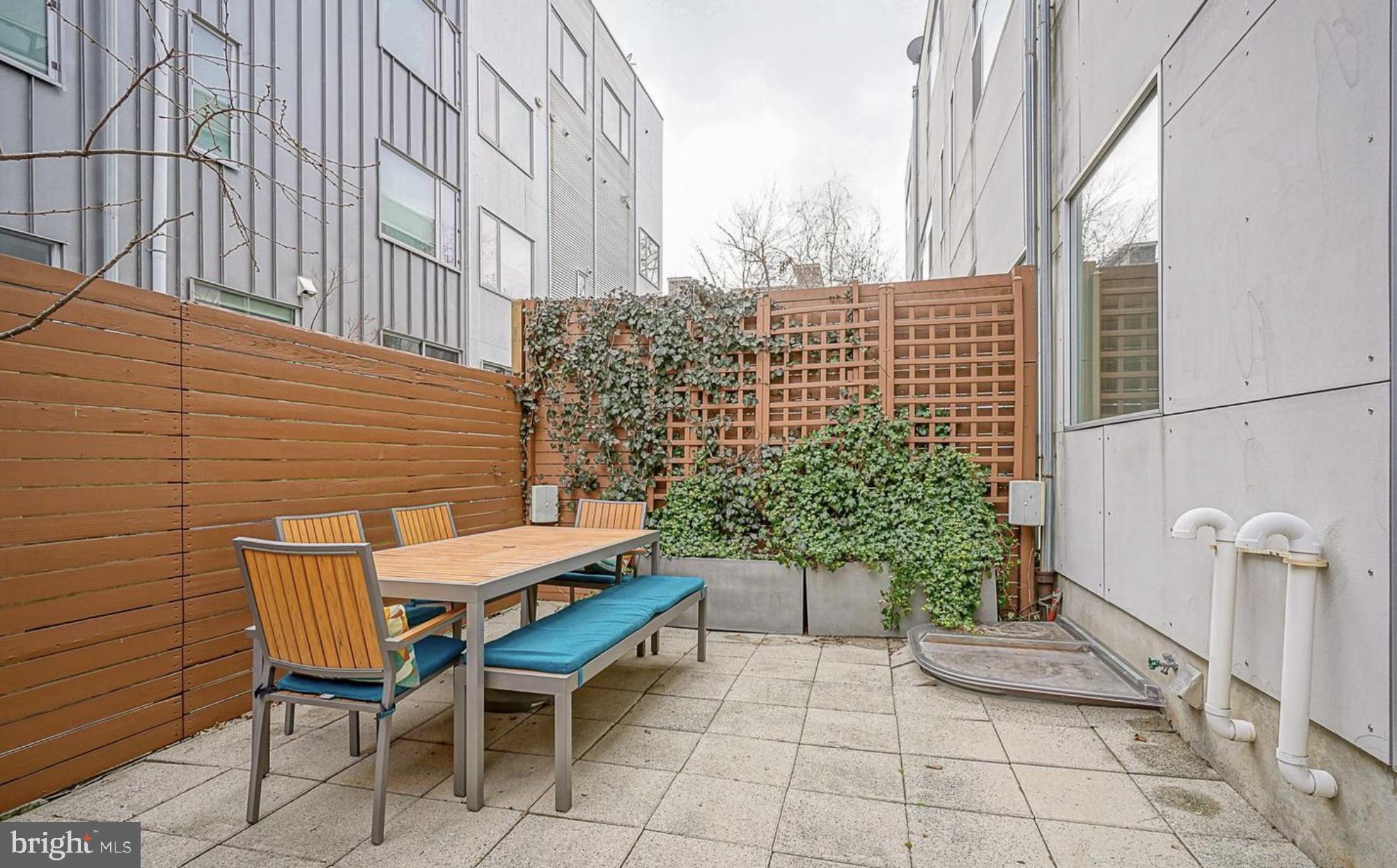 1119 North 3rd Street Philadelphia, PA 19123 - Photo 39 of 46 a balcony with table and chairs