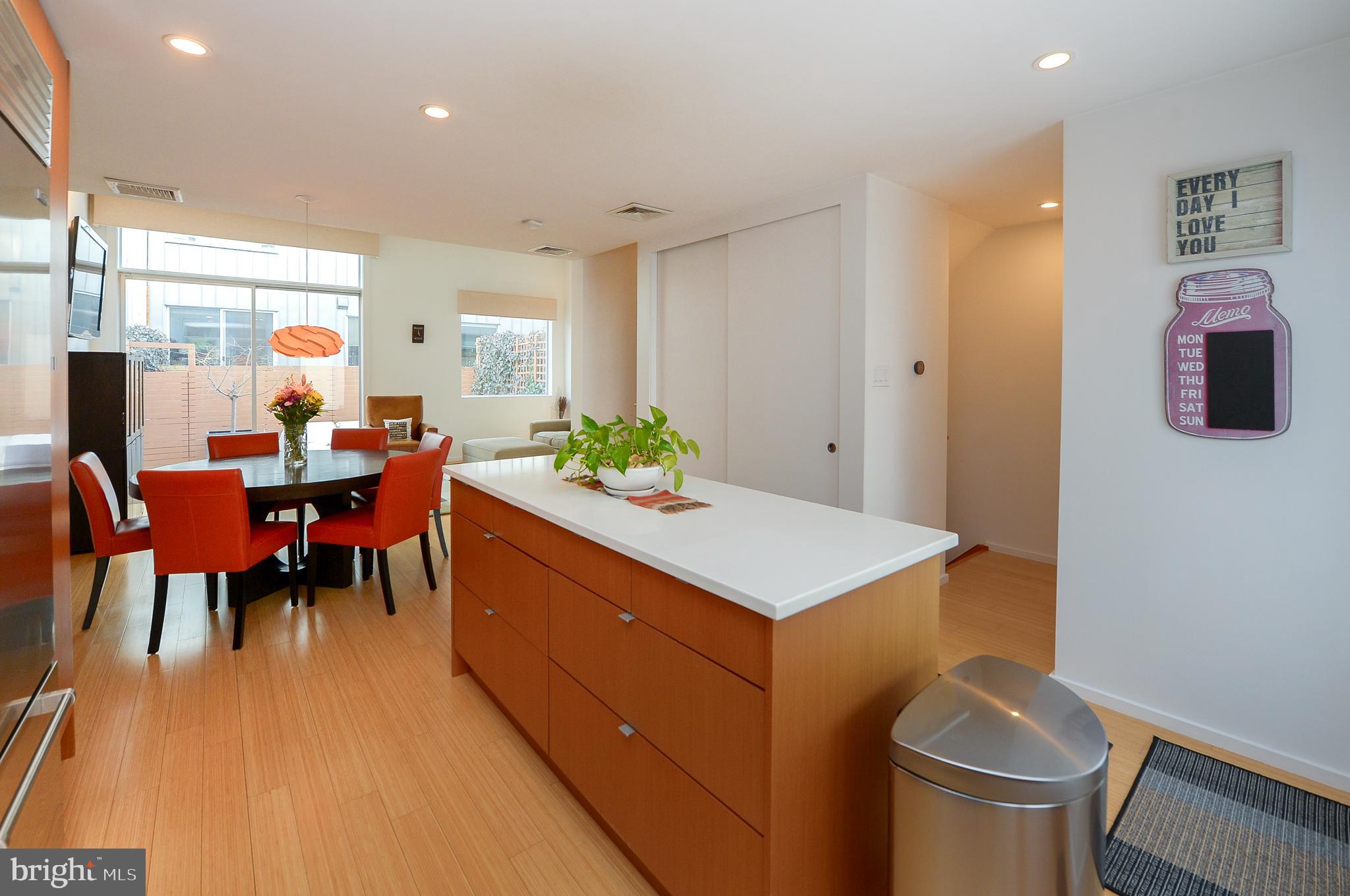 1119 North 3rd Street Philadelphia, PA 19123 - Photo 5 of 46 a view of a dining room with furniture and chandelier