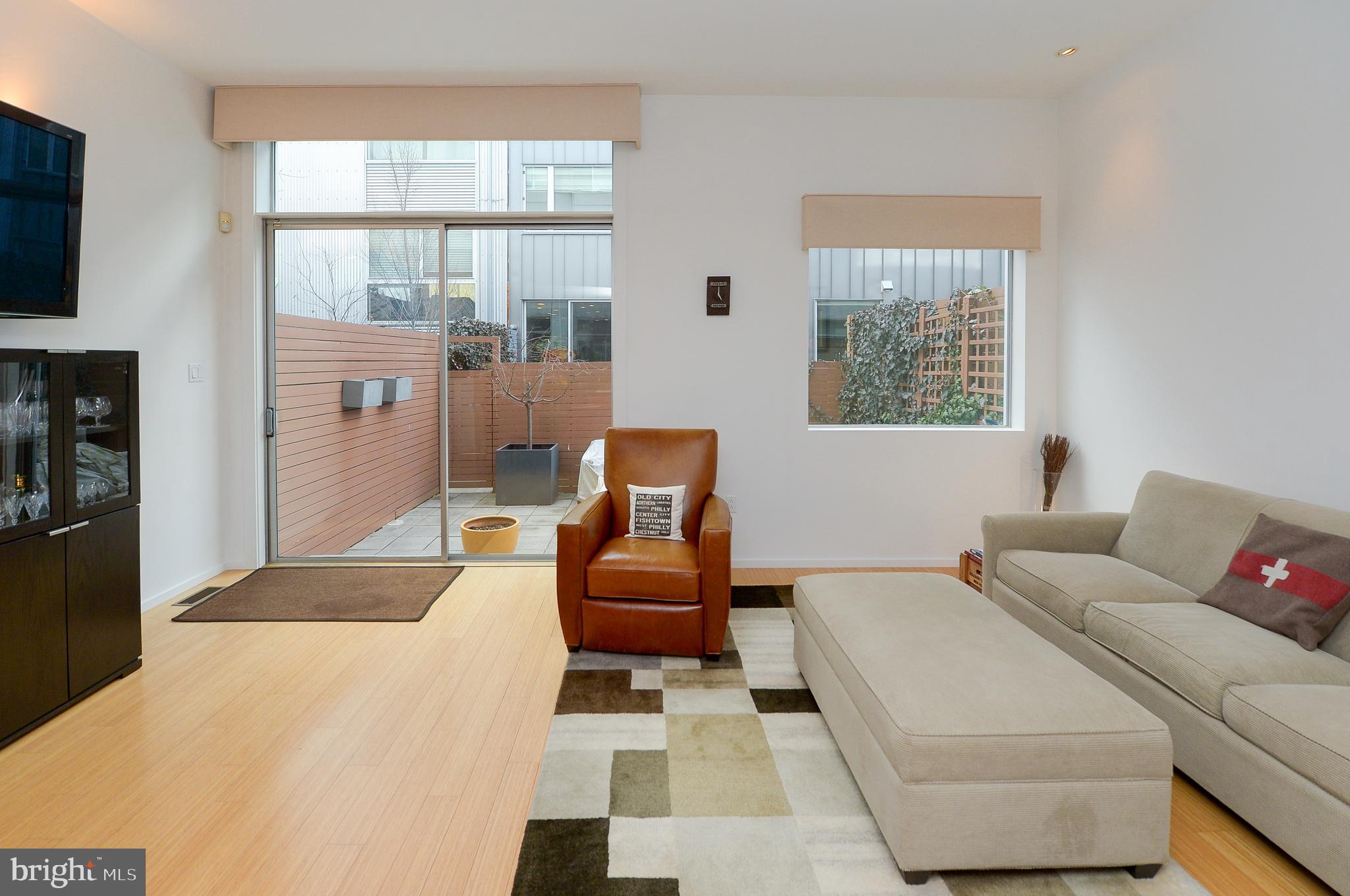 1119 North 3rd Street Philadelphia, PA 19123 - Photo 7 of 46 a living room with furniture and a window
