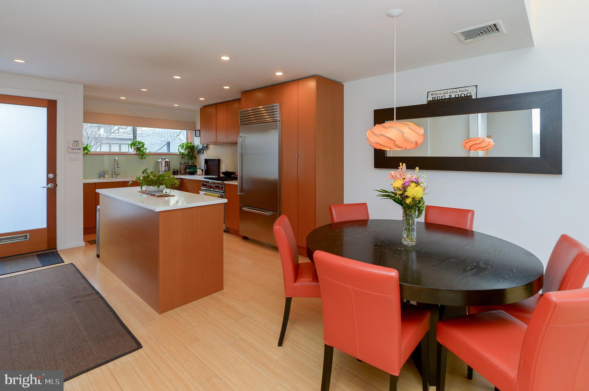 1119 North 3rd Street Philadelphia, PA 19123 - Photo 10 of 46 a dining room with furniture and a floor to ceiling window
