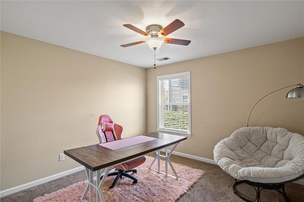 513 Constellation Overlook Southwest Atlanta, GA 30331 - Photo 14 of 32 a workspace with furniture and a window
