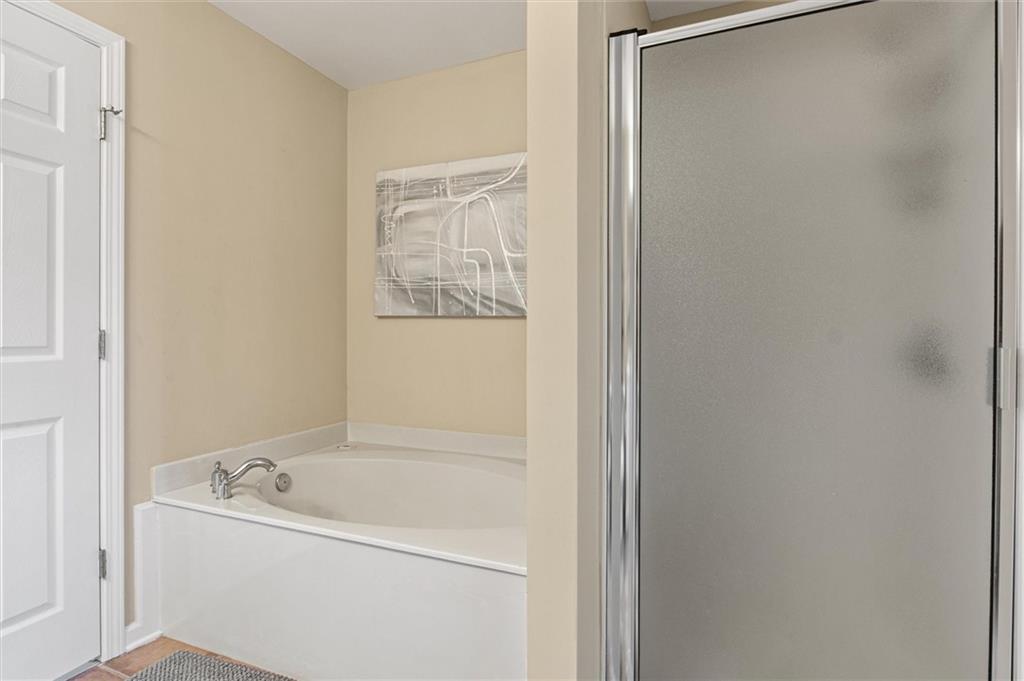 513 Constellation Overlook Southwest Atlanta, GA 30331 - Photo 18 of 32 a view of bathroom with bathtub and shower