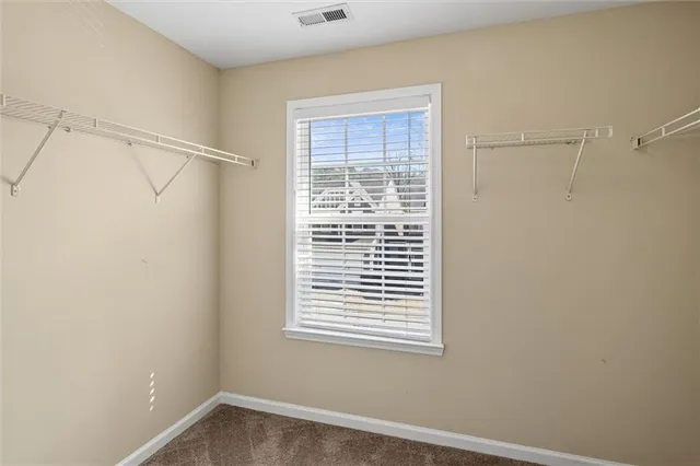 a view of a room that has a window in it