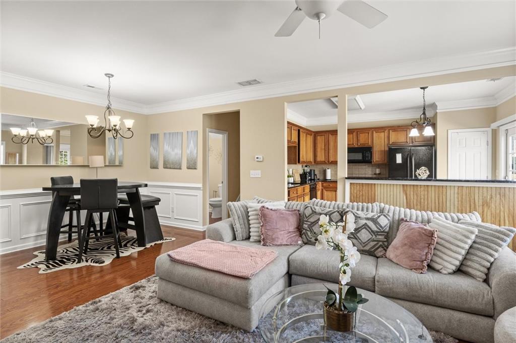 513 Constellation Overlook Southwest Atlanta, GA 30331 - Photo 8 of 32 a living room with furniture and kitchen view