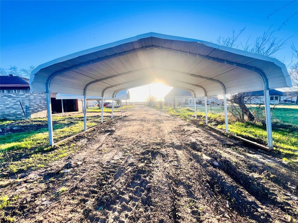 1325 County Road 319 Terrell, TX 75161 - Photo 22 of 32 CARPORT LEADING TO FRONT ENTRANCE AND SIDE GARAGE