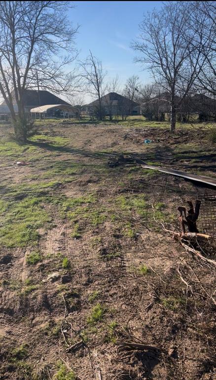 1325 County Road 319 Terrell, TX 75161 - Photo 24 of 32 BACK YARD VIEWS OF CARPORT AND NEWER SUBDIVSION PLENTY OF ROOM TO BUILD IN BACK