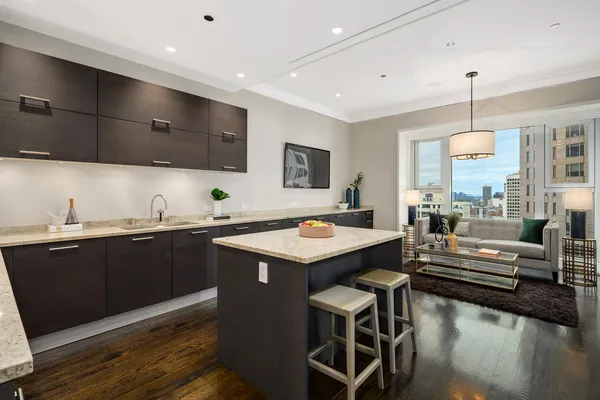 a kitchen with a sink and counter top space