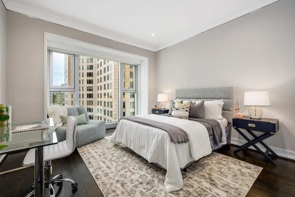 a bed room with a bed and a couch
