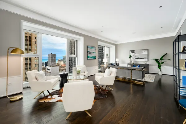 a living room with furniture and a table