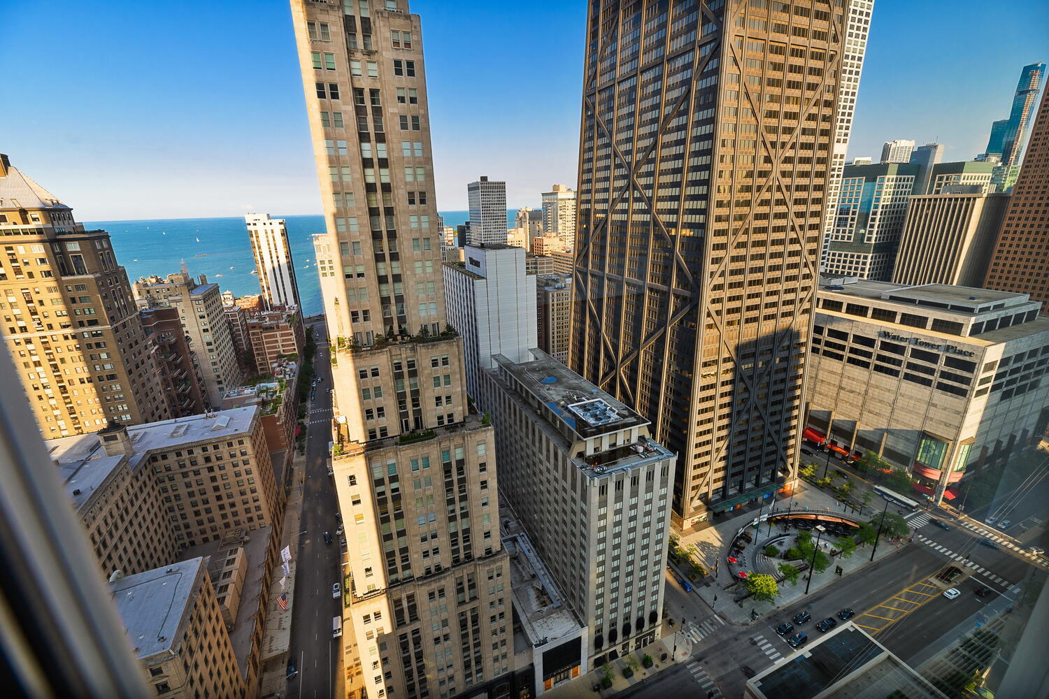77 East Walton Street, Unit 24A Chicago, IL 60611 - Photo 32 of 34 a city view with tall buildings