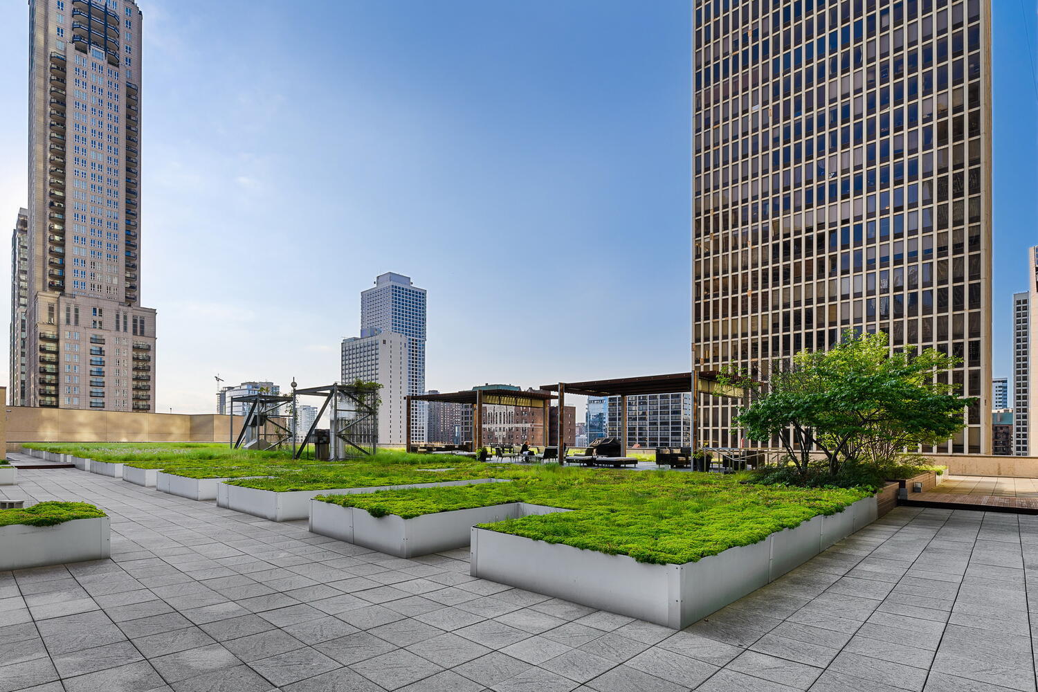 77 East Walton Street, Unit 24A Chicago, IL 60611 - Photo 34 of 34 a view of a city with tall buildings