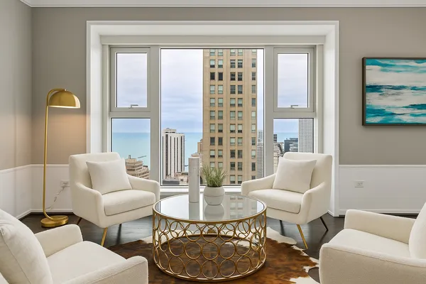 a living room with furniture and a window