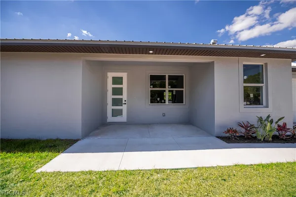 a view of a house with a patio