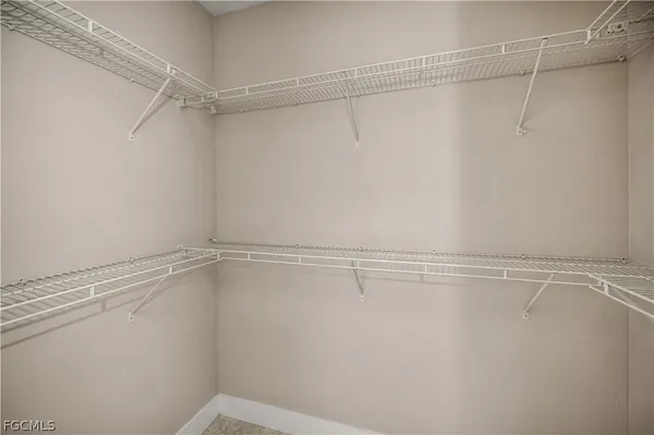 a view of a room with racks on the wall
