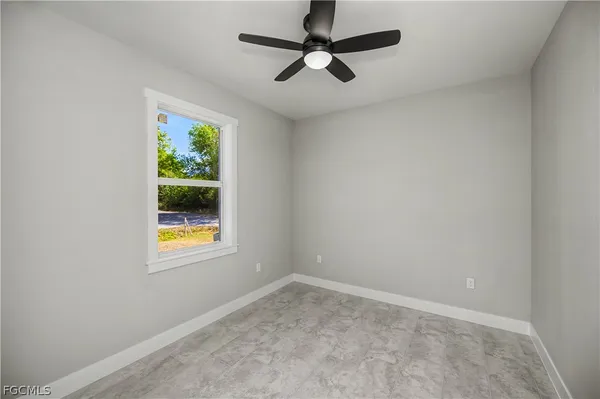 an empty room with window