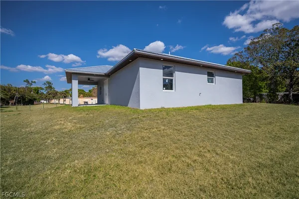 a house view with a garden space