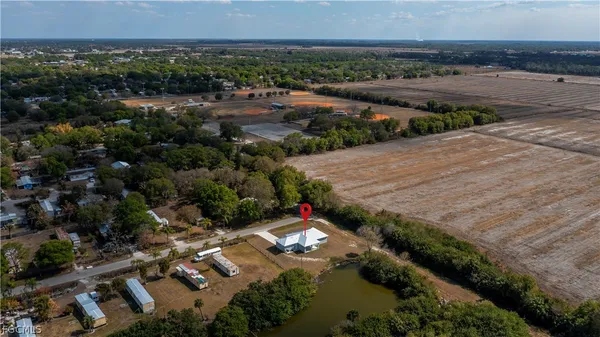 an aerial view of residential house and outdoor space
