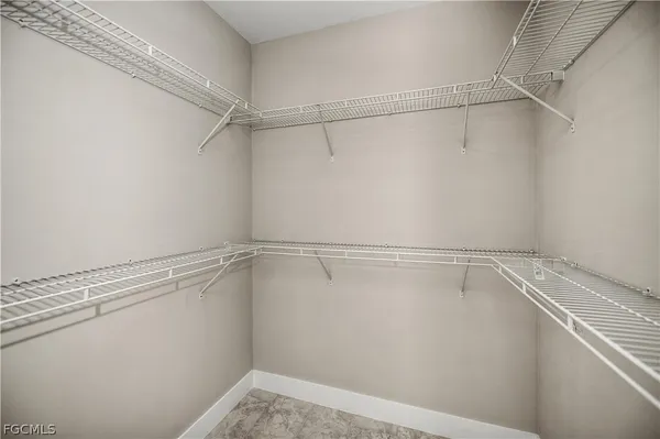 a view of a room with racks on the wall