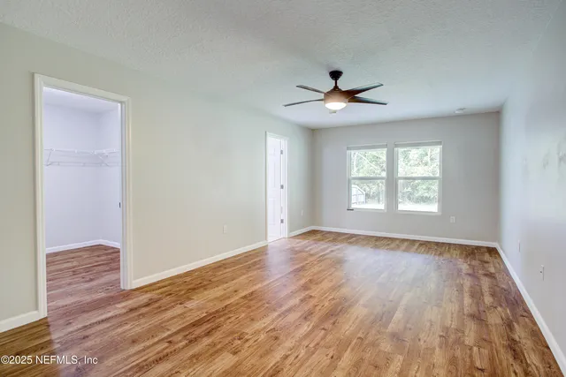 a view of a room with racks on the wall
