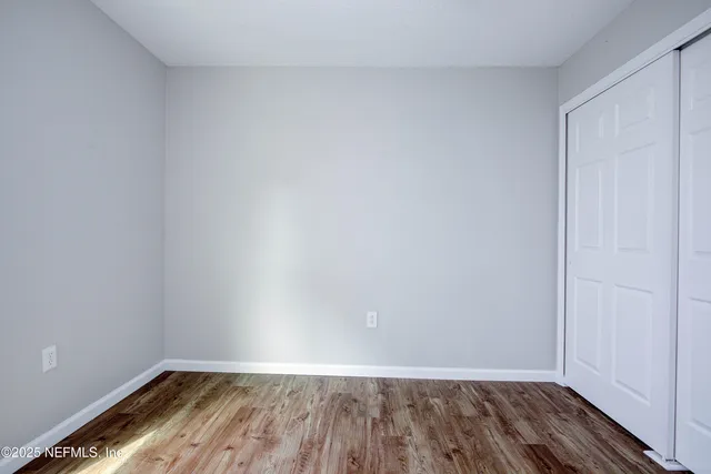 an aerial view of residential house with outdoor space and swimming pool