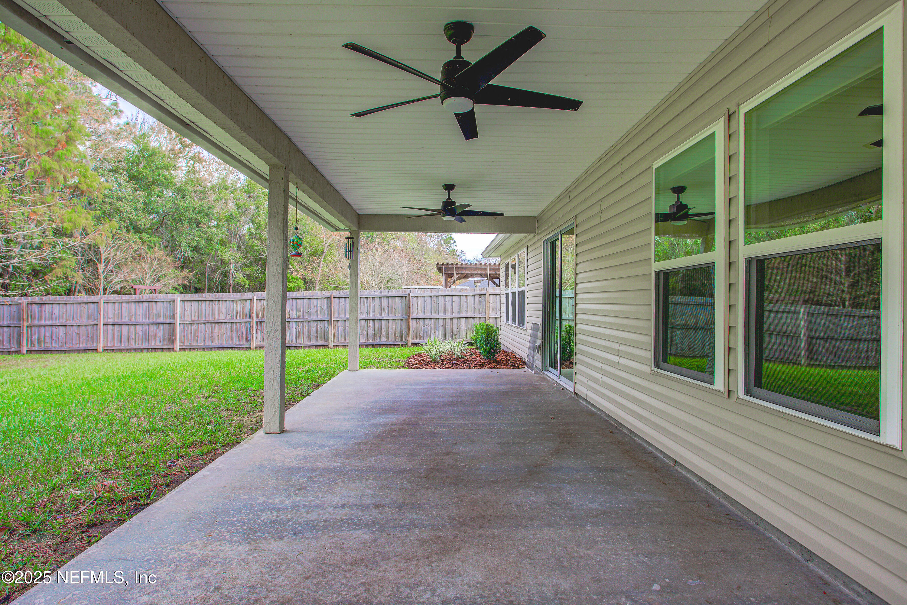 7341 Steventon Way Jacksonville, FL 32244 - Photo 62 of 75 a view of a garden with a fan