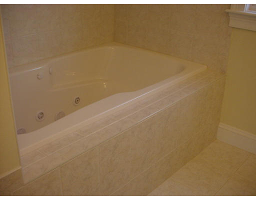 81 Higley Road Ashland, MA 01721 - Photo 16 of 16 a bathroom with a bathtub