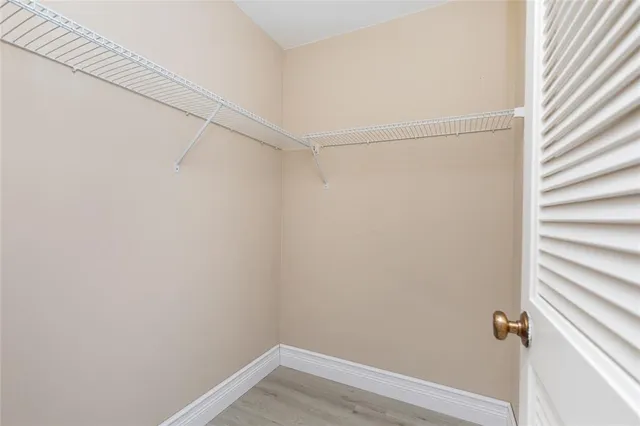 a view of a room with racks on the wall