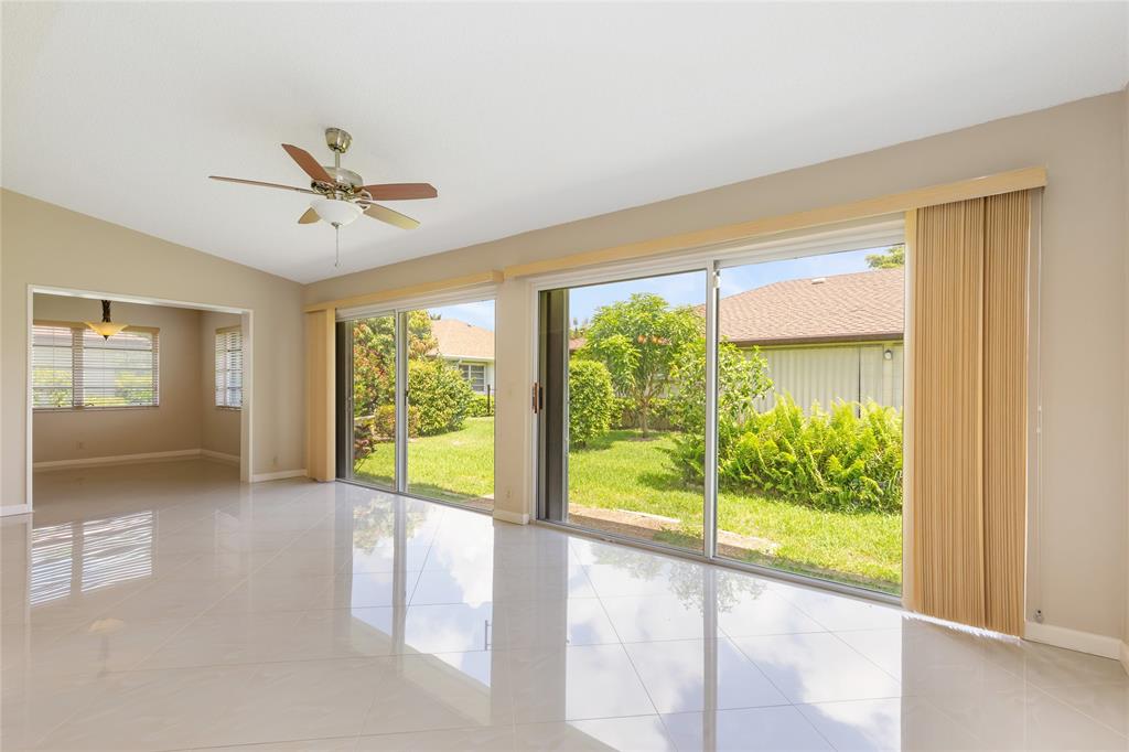 Undisclosed Address Boynton Beach, FL 33436 - Photo 4 of 16 a view of an empty room with a window