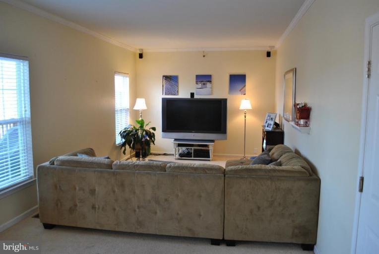 108 Stone Run Drive Rising Sun, MD 21911 - Photo 8 of 10 a living room with furniture and a flat screen tv