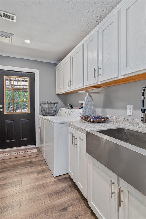 339 Cycle Plant Road Benton, LA 71006 - Photo 11 of 25 a kitchen with granite countertop a sink stainless steel appliances and cabinets