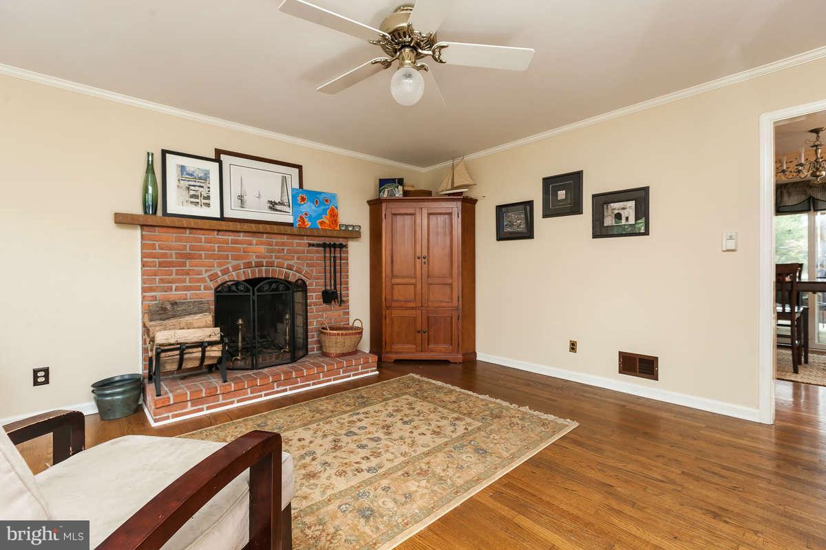 1769 Florence Road Mount Airy, MD 21771 - Photo 5 of 30 a living room with furniture and a fireplace