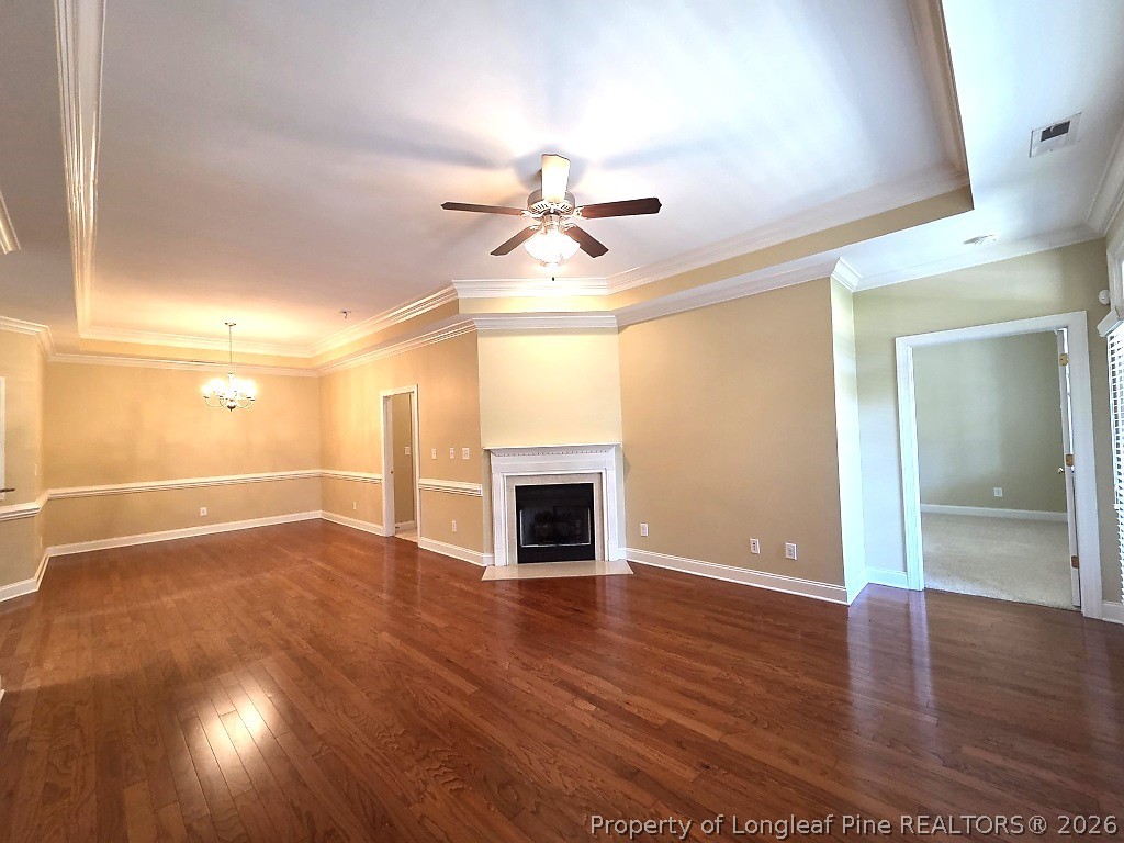 2671 Lockwood Road, Unit 202 Fayetteville, NC 28303 - Photo 12 of 32 wooden floor in an empty room with a window