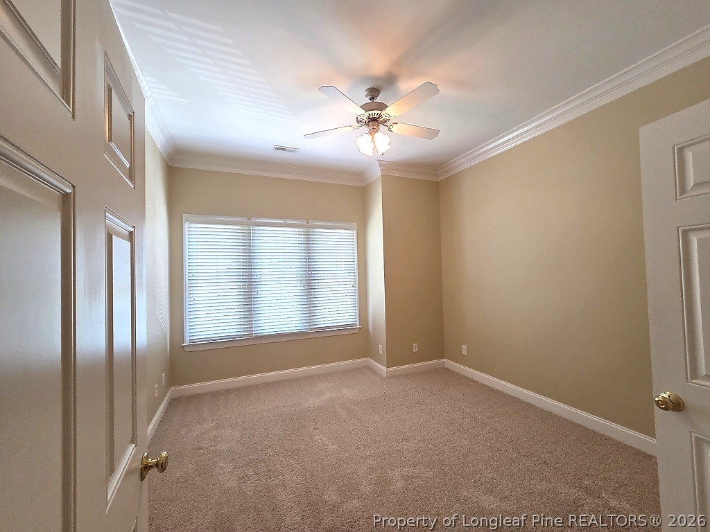 2671 Lockwood Road, Unit 202 Fayetteville, NC 28303 - Photo 17 of 32 a view of an empty room with a window