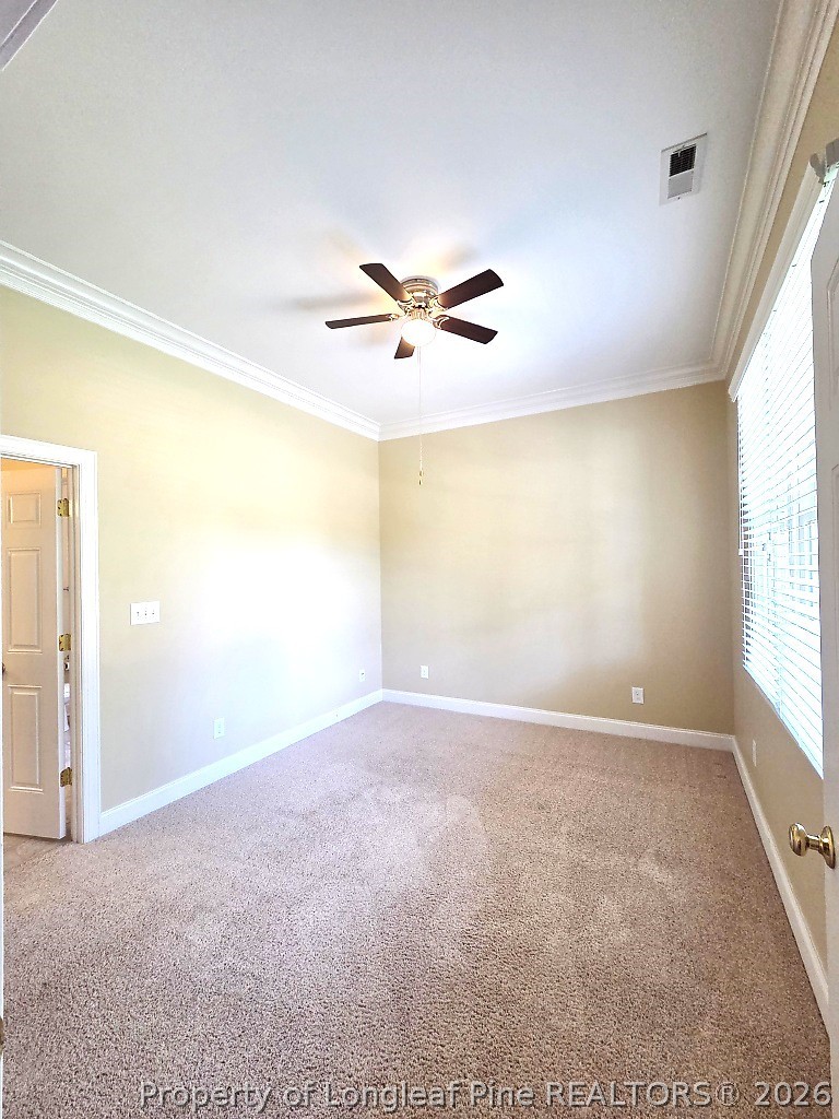 2671 Lockwood Road, Unit 202 Fayetteville, NC 28303 - Photo 25 of 32 a view of an empty room with a window