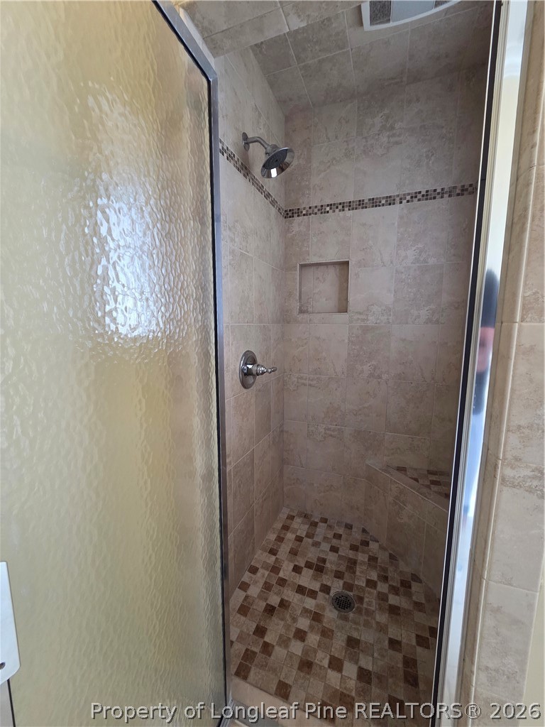 2671 Lockwood Road, Unit 202 Fayetteville, NC 28303 - Photo 27 of 32 a bathroom with a shower