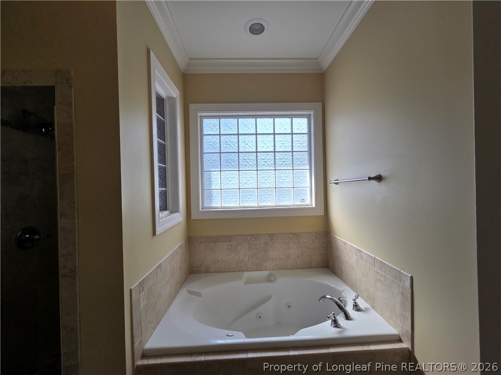 2671 Lockwood Road, Unit 202 Fayetteville, NC 28303 - Photo 29 of 32 a bathroom with a window