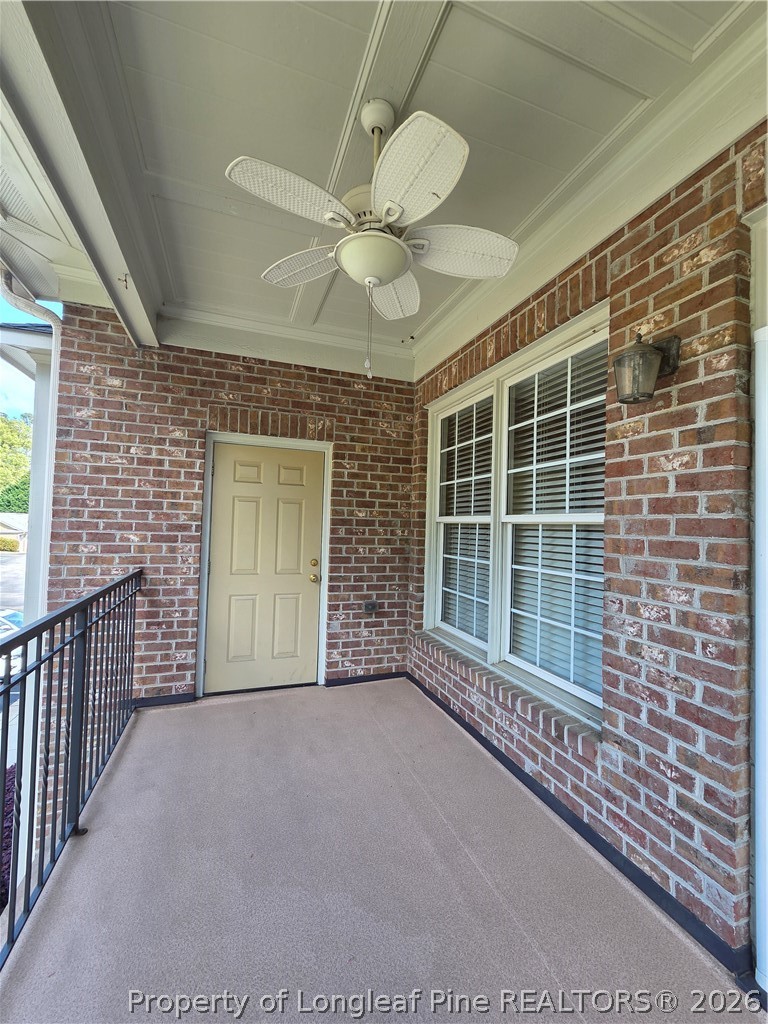 2671 Lockwood Road, Unit 202 Fayetteville, NC 28303 - Photo 30 of 32 a view of a livingroom with a ceiling fan and window
