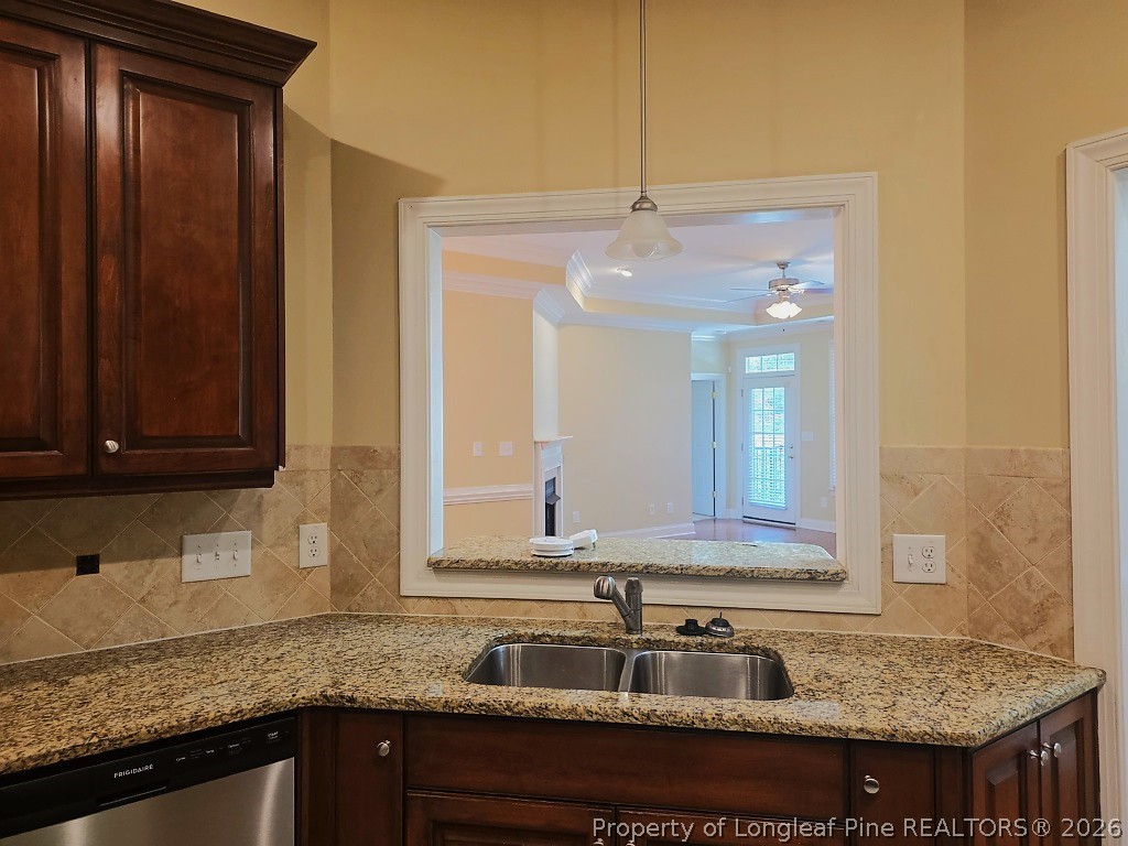 2671 Lockwood Road, Unit 202 Fayetteville, NC 28303 - Photo 6 of 32 a kitchen with granite countertop a sink and cabinets